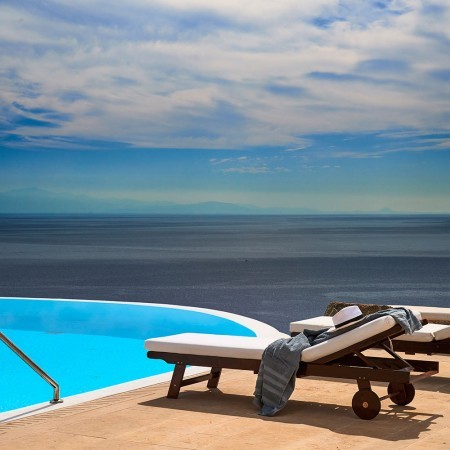 pool area and sea view at villa Siren Mykonos