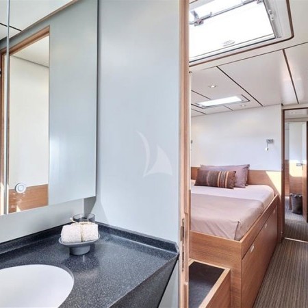 one of the boat's cabins and bathroom