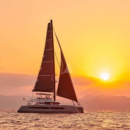 Alexandra II catamaran during sunset