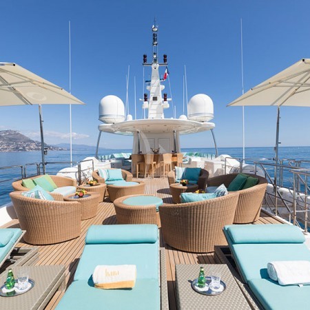 Hana superyacht deck lounge with sunbeams
