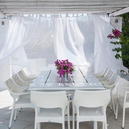 shaded dining with curtains