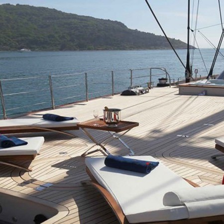 spacious deck lounge with sunbeds