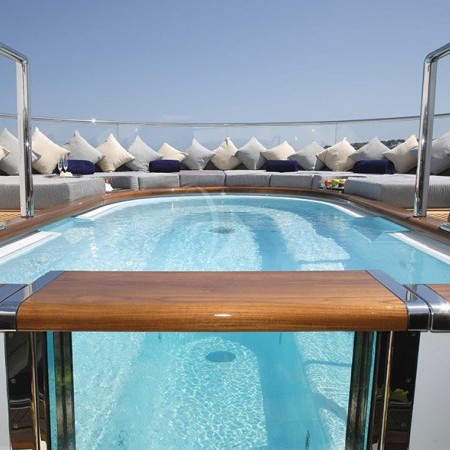the swimming pool of Wheels charter yacht