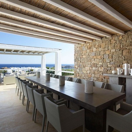 outdoor dining area with sea view