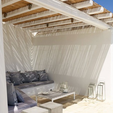 outdoor lounging area with sea view