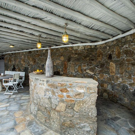 shaded dining at villa Chrissi Mykonos