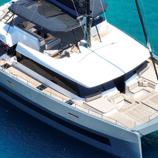 aerial photo of Moonlight sailing catamaran